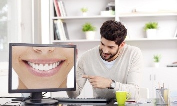 Dentist using virtual smile design software